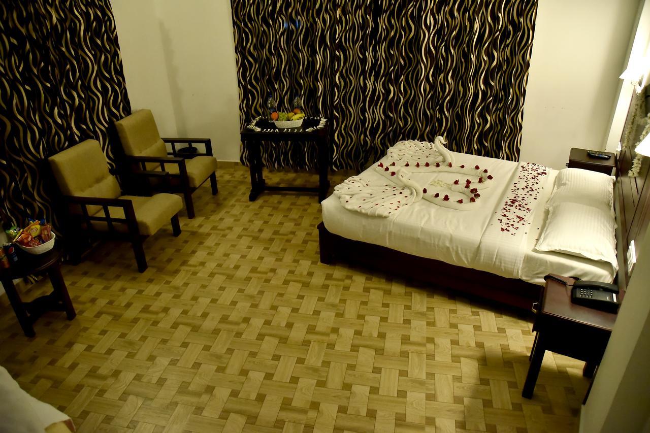 Natura Inn Munnar Esterno foto